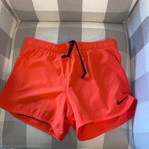 coral Nike shorts